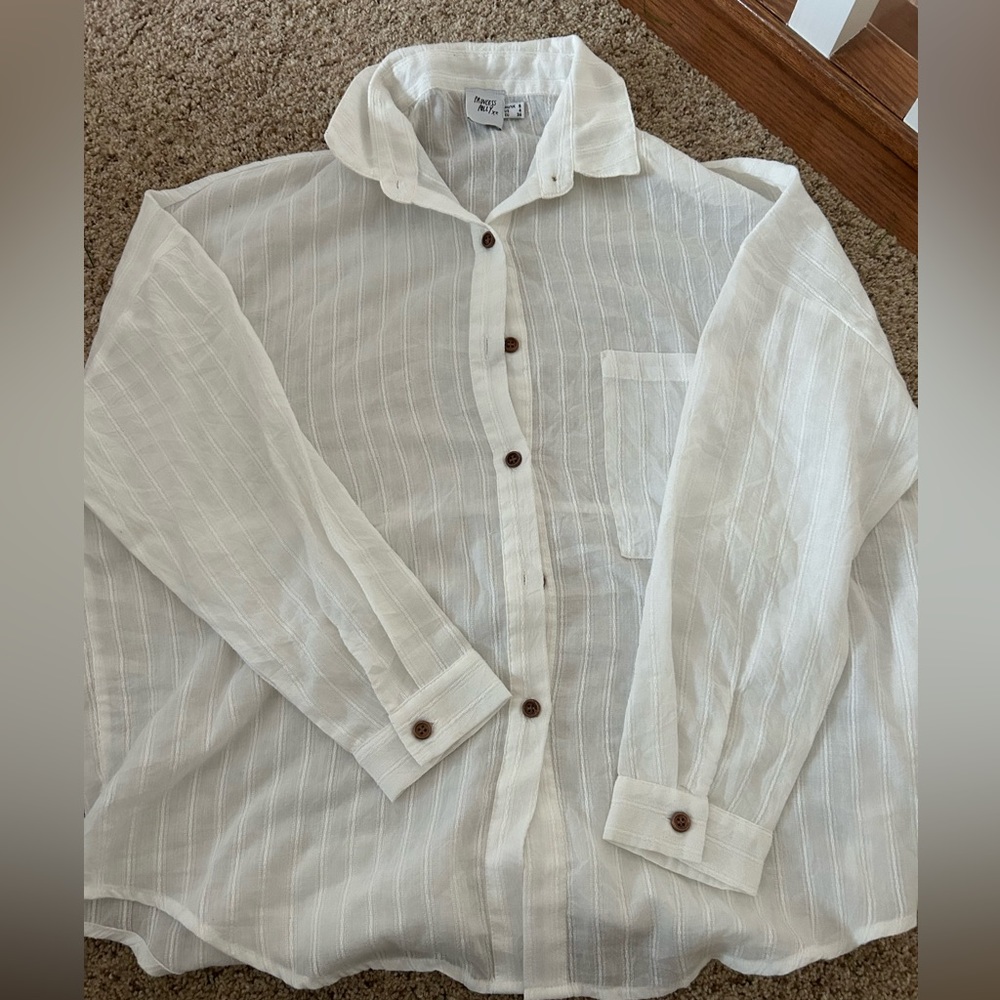 Slightly sheer white button up from princess polly